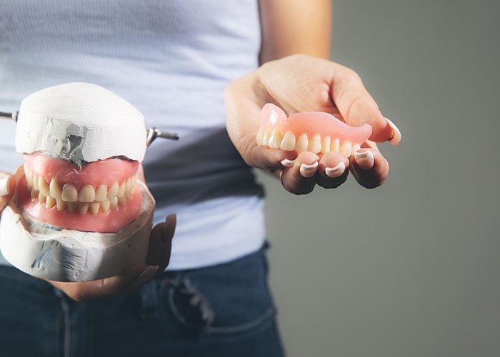 Dental Implant Process Step by Step Temporary Teeth after dental implant treatment