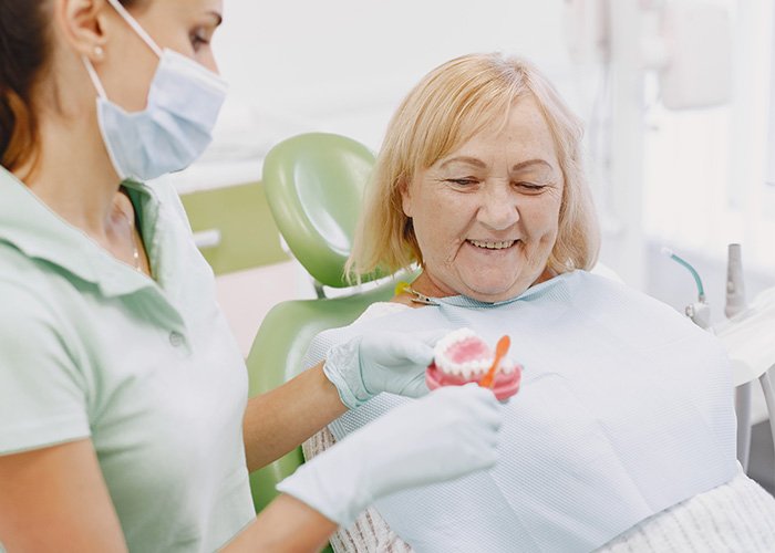 How to Care for Implant Retained Dentures